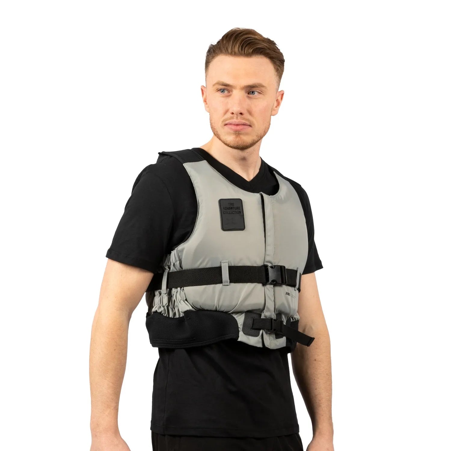 Man wearing a gray weighted vest Axopar Kayak or Sailing Adventure Vest